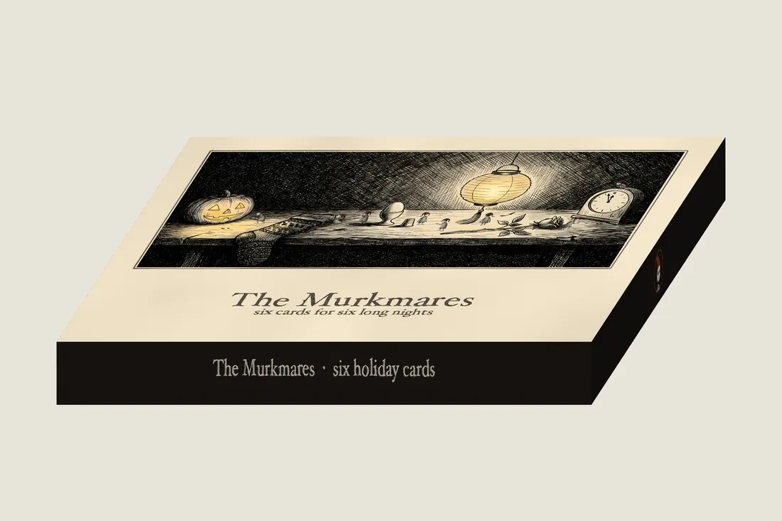 The card box, closed: a long night scene on the lid with a lit lantern and small Murkmares, titled six cards for six long nights